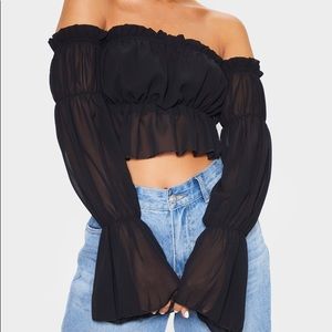 Black woven ruffle bardot sleeve blouse